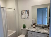 Thumbnail 8 of 43 - Bathroom at Elmwood Lake Apartments in Hudsonville MI