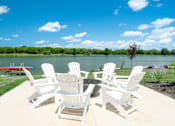 Thumbnail 25 of 43 - Private lake and dock at Hudsonville, MI Apartments and Townehomes | Elmwood Lake Apartments in Hudsonville MI