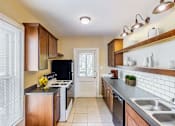 Thumbnail 3 of 25 - Spacious Kitchen in East Lansing Apartments near Michigan State University | MSU Houses