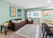 Thumbnail 4 of 26 - Spacious Living Room in East Lansing Apartments near Michigan State University | Glenwood