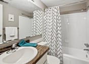 Thumbnail 8 of 26 - Spacious bathroom in East Lansing Apartments near Michigan State University | Glenwood