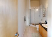 Thumbnail 18 of 50 - a bathroom with a toilet sink and shower