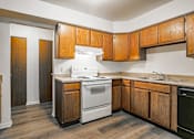 Thumbnail 5 of 34 - Kitchen in Muskegon Apartments | Lake Forest Apartments in Muskegon, MI