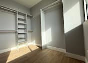 Thumbnail 32 of 47 - Large walk-in closet at Royal Oaks Apartments | Main Living Apartments in Royal Oak, MI
