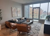 Thumbnail 7 of 47 - Living room at Royal Oak Apartments  |  Main Living Apartments in Royal Oak, MI