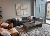 Thumbnail 6 of 47 - Living room at Royal Oak Apartments  |  Main Living Apartments in Royal Oak, MI