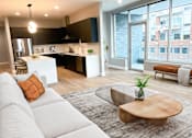 Thumbnail 14 of 47 - Living room at Royal Oak Apartments  |  Main Living Apartments in Royal Oak, MI