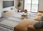 Thumbnail 1 of 19 - Spacious living room at Mason Hills Apartments in Mason, MI