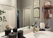 Thumbnail 25 of 53 - Bathroom at Haslett MI Apartments | Newton Place Apartments in Haslett, MI