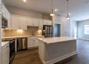 Thumbnail 13 of 53 - Kitchen at Haslett MI Apartments | Newton Place Apartments in Haslett, MI
