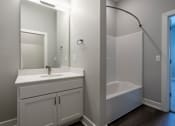 Thumbnail 27 of 53 - Bathroom at Haslett MI Apartments | Newton Place Apartments in Haslett, MI