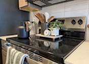 Thumbnail 12 of 53 - Kitchen at Haslett MI Apartments | Newton Place Apartments in Haslett, MI