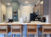Thumbnail 4 of 53 - Kitchen at Haslett MI Apartments | Newton Place Apartments in Haslett, MI