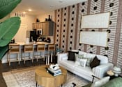 Thumbnail 1 of 53 - Spacious living room and kitchen at Newton Place Apartments in Haslett, Michigan
