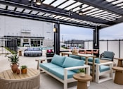 Thumbnail 34 of 53 - Pool deck at Newton Place Apartments in Haslett, Michigan