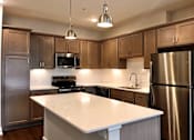 Thumbnail 8 of 53 - Kitchen at apartments in Haslett, Michigan | Newton Place Apartments in Haslett MI