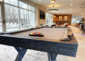 Thumbnail 42 of 53 - Pool table at Newton Place Apartments in Haslett, Michigan