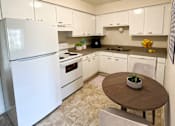 Thumbnail 3 of 15 - Kitchen at Okemos Village Apartments