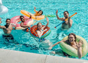 Thumbnail 34 of 36 - Swimming pool at Living room at Southfield MI Apartments | 42 West Apartments in Southfield Michigan