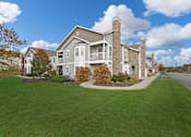 Thumbnail 25 of 26 - a large green lawn in front of a large house