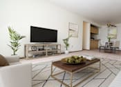 Thumbnail 3 of 18 - Living room at Sycamore Apartments in Holt, MI