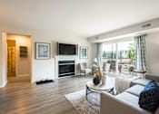 Thumbnail 2 of 34 - Spacious living room at The Emerson Apartment