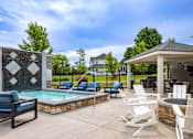 Thumbnail 46 of 54 - Pool and hot tub at Quarry Apartments and Townhomes in DeWitt Michigan