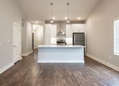 Thumbnail 30 of 54 - Open kitchen at the Quarry Apartments in DeWitt Michigan