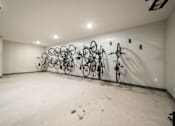 Thumbnail 24 of 27 - Bike room at Apartments in Grand Rapids | Trowbridge Flats Apartments Grand Rapids MI