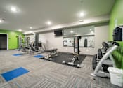 Thumbnail 22 of 27 - Fitness Center at Apartments in Grand Rapids | Trowbridge Flats Apartments Grand Rapids MI