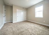 Thumbnail 10 of 27 - Bedroom at Apartments in Grand Rapids | Trowbridge Flats Apartments Grand Rapids MI