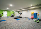 Thumbnail 23 of 27 - Fitness Center at Apartments in Grand Rapids | Trowbridge Flats Apartments Grand Rapids MI