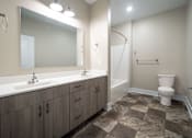 Thumbnail 14 of 27 - Bathroom at Apartments in Grand Rapids | Trowbridge Flats Apartments Grand Rapids MI