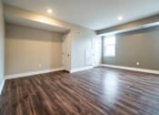 Thumbnail 12 of 27 - Living room at Apartments in Grand Rapids | Trowbridge Flats Apartments Grand Rapids MI
