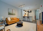 Thumbnail 6 of 35 - Living room at Vista at the Heights in Lansing, MI