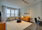 Thumbnail 4 of 35 - Living room at Vista at the Heights in Lansing, MI