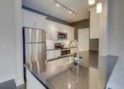 Thumbnail 3 of 35 - Kitchen Vista at the Heights of Eastwood Apartments near Eastwood Towne Center
