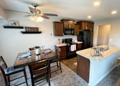 Thumbnail 13 of 14 - Spacious Living Room in East Lansing Apartments near Michigan State University | Woodbrook Village Apartments