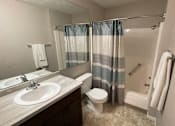 Thumbnail 12 of 14 - Spacious bathroom in East Lansing Apartments near Michigan State University | Woodbrook Village Apartments