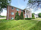 Thumbnail 3 of 5 - Exterior at Woodruff House Apartments in Lansing, MI