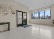 Thumbnail 12 of 16 - the preserve at ballantyne commons living room with glass doors and windows