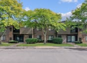 Thumbnail 41 of 44 - our apartments are located in a quiet neighborhood with trees and grass