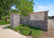 Thumbnail 29 of 46 - Stone wall with a Property Sign at Lafayette Park Place, Detroit, MI, Michigan, 48207