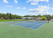 Thumbnail 25 of 50 - our apartments offer a tennis court