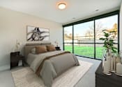 Thumbnail 7 of 38 - A bedroom with a large bed and a painting on the wall.