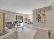 Thumbnail 10 of 41 - Model Living Room at Rochester Club Apartments - Rochester, MI, Michigan, 48306