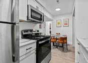 Thumbnail 2 of 21 - stainless steel appliances at Park On Canal Apartments, Clinton Twp, MI, 48038