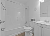 Thumbnail 14 of 41 - a bathroom with a sink toilet and a shower