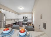 Thumbnail 4 of 41 - Dining And Kitchen at Rochester Club Apartments - Rochester, MI, Rochester Hills, MI, 48306