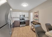 Thumbnail 1 of 41 - dining area off kitchen at Rochester Club Apartments - Rochester, MI, Michigan, 48306